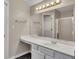 Large mirror over bathroom vanity with ample counter space and storage at 1922 Knipe Sw Dr, Marietta, GA 30064