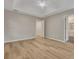 Spacious bedroom featuring light wood flooring and neutral gray paint at 1922 Knipe Sw Dr, Marietta, GA 30064