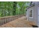 Relaxing outdoor deck with views of the wooded backyard, ideal for enjoying nature and fresh air at 1922 Knipe Sw Dr, Marietta, GA 30064