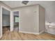 Hallway featuring light wood flooring and neutral gray paint at 1922 Knipe Sw Dr, Marietta, GA 30064