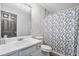 Bathroom with decorative wallpaper, shower, and vanity at 1314 Durham Ter, Mcdonough, GA 30252