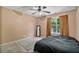 Cozy bedroom featuring plush carpeting and natural light at 1314 Durham Ter, Mcdonough, GA 30252