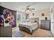 Bedroom featuring a bed, large window, and stylish decor at 1314 Durham Ter, Mcdonough, GA 30252