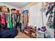 Walk-in closet with custom shelving, racks and storage solutions at 1314 Durham Ter, Mcdonough, GA 30252