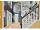 Grand foyer featuring hardwood floors, a staircase, and a view to the second floor at 1314 Durham Ter, Mcdonough, GA 30252