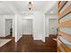 Bright foyer featuring dark wood floors, white walls, and a view into other rooms at 1749 Ridge Valley Nw Ct, Atlanta, GA 30327