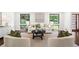Stylish living room with modern decor, comfortable seating, and large windows offering scenic views at 1749 Ridge Valley Nw Ct, Atlanta, GA 30327