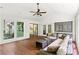 Sunroom featuring wood floors, multiple windows, and comfortable furniture at 1749 Ridge Valley Nw Ct, Atlanta, GA 30327