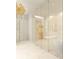 Bright bathroom features marble floors, statement lighting, sleek vanity, and a glass-enclosed shower at 260 Mayfield Rd, Alpharetta, GA 30009