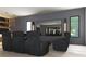 Home theater with plush seating, a large screen for immersive entertainment, and custom ambient lighting at 260 Mayfield Rd, Alpharetta, GA 30009