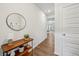 Bright entryway with hardwood floors and modern decor, showcasing a welcoming entrance at 302 Braswell Ct, Woodstock, GA 30188