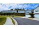 New townhomes with attached garages on a pristine street, offering modern living in a well-kept community at 302 Braswell Ct, Woodstock, GA 30188