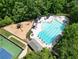 A bird's eye view of community amenities including swimming pool, playground, tennis courts, and clubhouse at 3052 Fleet Sw St, Marietta, GA 30064