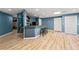 Finished basement with wet bar, recessed lighting, and wood flooring at 3052 Fleet Sw St, Marietta, GA 30064