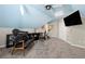 Bonus room featuring blue ceiling, entertainment center, and comfortable seating at 3052 Fleet Sw St, Marietta, GA 30064