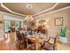 Formal dining room with chandelier and decorative ceiling at 3052 Fleet Sw St, Marietta, GA 30064