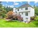 Stunning backyard view with deck, covered patio with hot tub, and well-maintained lawn and landscaping at 3052 Fleet Sw St, Marietta, GA 30064