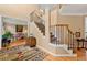 Inviting foyer features hardwood floors and staircase at 3052 Fleet Sw St, Marietta, GA 30064