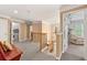 Upstairs hallway leading to bedrooms and laundry room with carpeted floors at 3052 Fleet Sw St, Marietta, GA 30064
