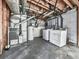 Basement utility area with water heater, furnace, washer and dryer at 712 Copper Trace Way, Woodstock, GA 30189