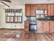The kitchen shows dark cabinets and a window over the sink area at 712 Copper Trace Way, Woodstock, GA 30189