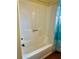 Shower tub combination with a white surround and a blue and white shower curtain at 712 Copper Trace Way, Woodstock, GA 30189