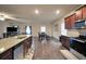 Modern kitchen with stainless steel appliances overlooking dining and living areas at 157 Oliver Dr, Locust Grove, GA 30248
