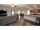 Open-concept living room with dining area and kitchen view at 157 Oliver Dr, Locust Grove, GA 30248
