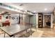 Finished basement featuring a ping pong table, ample lighting, and additional recreational space at 173 Price Rd, Brooks, GA 30205
