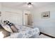 A spacious bedroom with white walls, a ceiling fan, closet and bed at 173 Price Rd, Brooks, GA 30205