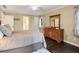 Spacious main bedroom featuring hardwood floors and an ensuite bathroom at 173 Price Rd, Brooks, GA 30205