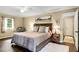 Inviting main bedroom featuring dark hardwood floors and a cozy, comfortable atmosphere at 173 Price Rd, Brooks, GA 30205