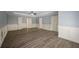 Spacious bedroom with neutral walls, hardwood floors, and bright natural light at 2548 Kickerillo Se Way, Atlanta, GA 30316