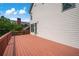 Spacious wooden deck with stained floorboards and a view of the side of the home at 2548 Kickerillo Se Way, Atlanta, GA 30316
