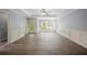Bright living room featuring hardwood floors, neutral walls, and a ceiling fan for added comfort at 2548 Kickerillo Se Way, Atlanta, GA 30316