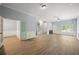 Expansive open-concept living space features hardwood floors, a wet bar and natural light at 2548 Kickerillo Se Way, Atlanta, GA 30316