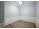Office space features hardwood floors and neutral gray colored walls at 2548 Kickerillo Se Way, Atlanta, GA 30316