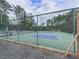 Community tennis and swimming pool featuring a pickleball court for active recreation and social gatherings at 3623 Spring Meadow Ct, Acworth, GA 30101