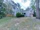 Two story home featuring an attached garage and well-maintained lawn at 3623 Spring Meadow Ct, Acworth, GA 30101