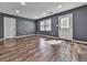 Bright room features hardwood floors, recessed lighting, a window, and a door at 3623 Spring Meadow Ct, Acworth, GA 30101
