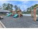 Community playground with slides, climbing structures, swings, and a tennis court, ideal for Gathering fun at 3623 Spring Meadow Ct, Acworth, GA 30101