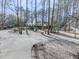 Charming two-story home nestled among trees, offering a peaceful retreat at 5090 Eubanks Rd, Woodstock, GA 30188