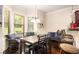 Cozy breakfast nook with bay window and seating, next to breakfast bar at 108 Telfair Ln, Mcdonough, GA 30253