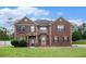 Charming two-story brick home with manicured lawn and inviting front entrance at 108 Telfair Ln, Mcdonough, GA 30253