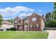 Beautiful brick home with a well-maintained lawn and inviting curb appeal at 108 Telfair Ln, Mcdonough, GA 30253