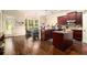 Spacious eat-in kitchen with island, stainless appliances, and hardwood floors at 108 Telfair Ln, Mcdonough, GA 30253