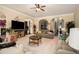 Inviting living room featuring plush seating, neutral decor, and open layout at 108 Telfair Ln, Mcdonough, GA 30253