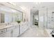 Elegant bathroom with double vanity, marble countertops and floor, glass shower, and separate soaking tub at 2652 Brickell Sq, Atlanta, GA 30341