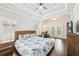 Spacious bedroom featuring natural light, tray ceiling, hardwood floors, and an adjacent study area at 2652 Brickell Sq, Atlanta, GA 30341