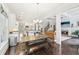 Bright dining area open to a modern kitchen and a cozy living room with a fireplace at 2652 Brickell Sq, Atlanta, GA 30341